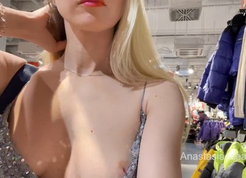 Exhibitionist Doll In Sexy Dress Flashes Her Hot Boobs In Public Store